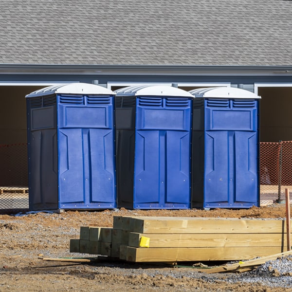 what is the cost difference between standard and deluxe portable toilet rentals in Patterson Arkansas